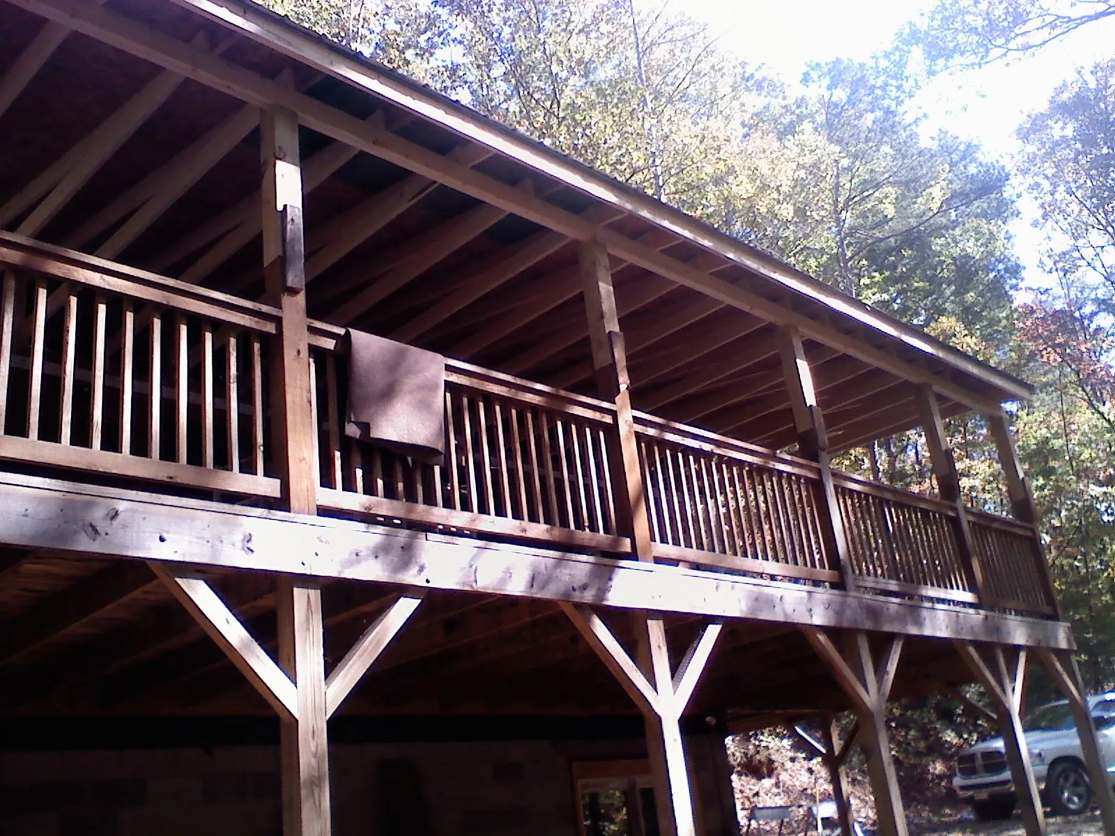 Timber framing under a new elevated porch and deck — Roof Leak Repair in Brewton by Roofing Brothers